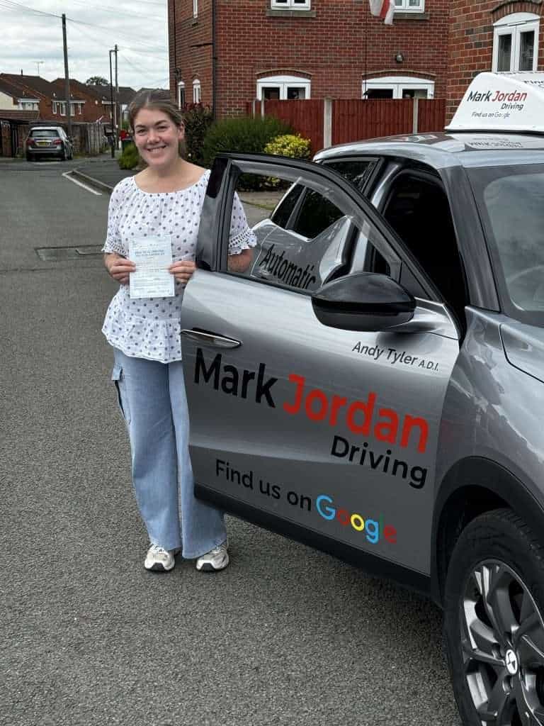 Learner driver celebrating a driving test pass at Burton Test Centre with Mark Jordan Driving School in Burton upon Trent.