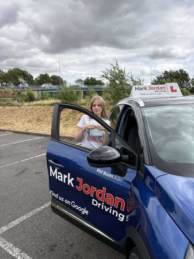 Emily of Swadlincote passing her driving test in a Mark Jordan Driving School Car
