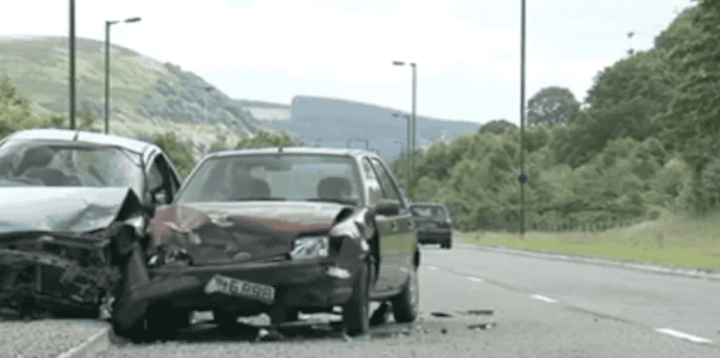 Two badly damaged cars following a serious road traffic collision.